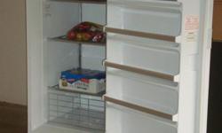 Frigidaire Upright Freezer - like new. 14.0 cu.ft. saves money while conserving energy with its ENERGY GUIDE qualification. Model No. MFU14M2Bw1. Manual defrost.