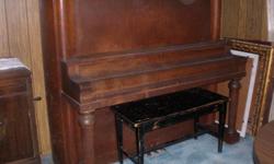 Schumann upright piano. Made in Chicago, USA. We've had for over 40 years and bought used. Was used for kids practice and family enjoyment. :)
&nbsp;