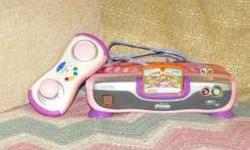 Pink/Purple V-Tech V-Smile Motion Game Console with Pink/Purple Controller - Used once!
3 Games
-Action Mania - Came with game console - Used once
-Disney Fairies TinkerBell - Never opened - Appropriate for ages 4-6 years
-Dora the Explorer Fix-It