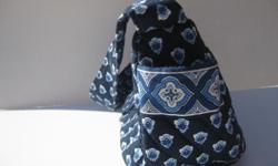 Small dark blue with cute little blue flowers. Excellent condition.