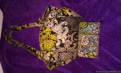 This is the Baroque Vera Bradley Purse with Signature Collection full size Wallet. Both are in Great Condition. Asking 60 for both. ...Call or text 210-708-5115/ or...601-701-5315
