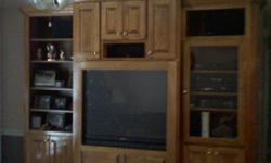 3 pc, 8 ft center, two 7 ft 8 inch side pieces, 9 ft wide, plenty of storage, 48" Sony Plasma T.V in great condition.
