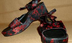 Vinca Rose women's black and red shoes. Black satin type fabric with red flowers. Chunk heel. Buckles around the ankle. Excellent condition! Very cute!
Women's size 9
PayPal or Google Checkout accepted. I have a 100% seller rating on Ebay (under the