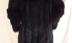 Stunning vintage dyed black badger fur. This fur was professionally cleaned and revitalized by Miller's Furs of Tysons Galleria - renowned master furriers. This fur is from The John Shillito Company of Cincinnati, Ohio. The Shillito name was merged with a