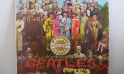 The Beatles
Rare Hard To Find. Printed in Venezuela by Parlophone Serie De Oro.
Title - Sgt Peppers Lonely Hearts Club Band
Label - Parlophone
Code - LMTP-8006
Released - 1967
Condition - NM / VG
Songs
Side One
Sgt Peppers Lonely Hearts Club Band
With A