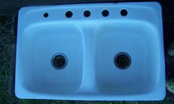 Vintage American Standards cast iron porcelain double sink. In good condition. Make an offer.