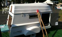 Brand new American Dream Trailer comes with mattress, oars, oarlocks wheel chocks and title. It is perfect from every angle and yes, the boat fits upside-down on top of the trailer. Looking for a quick local sale so I can start building the next one.