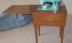 This is vintage sewing machine in really good condition.&nbsp; There is even the original instruction manual with it.