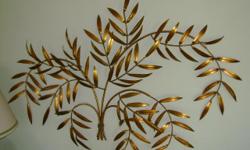 BEAUTIFUL Wall decoration for a space you cant fill in just right. Its bronze in color & gorgeous!
