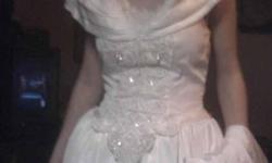 wedding dress size 7 worn only once for a few hours great condition long train
if interstead
call (815)727-9650