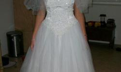 Beautiful size 10 wedding dress and veil. &nbsp;Worn once. &nbsp;See pictures below.