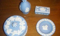 Blue Wedgwood jasperware collection. Four pieces. Made in England. Retail value is $150. Will sell entire set for $50. Please send all questions or offers to the address provided. Thanks.