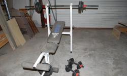 Weider 128 bench, One 5' Weight Bar, Two Dumbbell Bars, Six Bar Colors, SIx 10 lbs Weights, Six 5 lbs Weights and Four 2-5 lbs Weights. All cast iron weights. Good set for beginer or intermediate user.