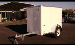 This Wells Cargo TC461 Enclosed Cargo Trailer is 6FT Long and 4FT Wide, it has 1 2,000 Lbs Axle, A DOT Lighting Package, a GVWR of 2,000 Lbs, 14 Inch Radial Tires With A Customer Care Club Membership, Spare Tire, Mount, and Rim, One Year Warranty, Wood