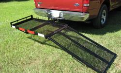 Carrier for electric wheelchair or scooter.Light weight ramp for loading. Tie downs. This is a very economical and easy way to carry your wheelchair.
We are the manufacturer.
Coxco Fabrication
Custom trailers
In Tampa since 1983