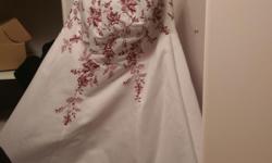 White wedding dress with red sequins comes with a veil and other pieces it was purchased brand new from David's Bridal still has tags on it it's never been worn or altered asking 400 or best offer all reasonable offer will be considered. If interested in