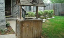 Wishing Well - $200
Heavy construction, 2x4 and 1x4. Pumps water through the old pump head from a bucket inside.
Just fill the bucket with water and it is pumped through the old pump until it evaporates.
There are no broken, rotted or missing parts.
It is