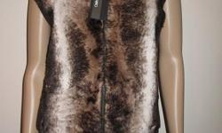 This faux fur vest from Cristina Gavioli features zip front closures. The faux fur exterior is fun and fashionable stylish addition to any wardrobe.
?Color options: Brown, beige, blue
?Without lining
?zipper closure
?Faux fur covered
?50-percent merinos
