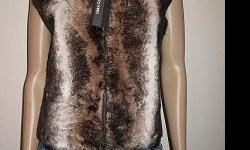 This faux fur vest from Cristina Gavioli features zip front closures. The faux fur exterior is fun and fashionable stylish addition to any wardrobe.
Color options: Brown, beige, blue, black
Without lining
zipper closure
Faux fur covered
50-percent merinos
