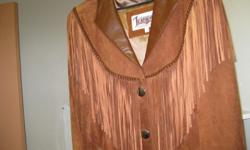 Diamond Leathers women's western leather fringed full length coat is expertly crafted of genuine suede leather. Color is chocolate. Size Medium. Excellent condition. Paid $400, sell for $75. Cash Only! Reply only if interested in purchasing. Call