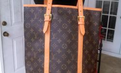 I have a Louis Vuitton Bucket Style Handbag. Has leather trim. Asking $75
