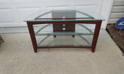 Holds up to 40 inch screen.
18 wide 22 height 40 width
3 Glass shelves
See picture
Call Chet --