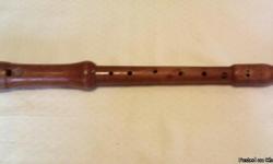 The 19 inch 7 hole wood recorder was a collectible display item for a school band director and music teacher, but can be played.&nbsp; The large harmonica is 10 inches long X 2 inches wide.