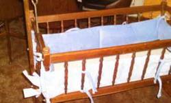 I have a small wooden cradle that is in good condition
I also have some light blue bumpers for the cradle. They are free with cradle. Like New...used a few times with son in cradle
Comes from a clean, smoke free and pet free home
Please contact ME at