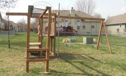 Two swings, Bar swing, Monkey Bars. Firemen pole, Two platform steps. Condition Used but good.