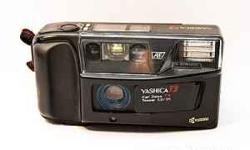 Yashica T2 AF camera ? Carl Zeiss Tessar 35/35 ? with case ? like new rarely used. Call tomrover at optonline.net or Tom Taylor at 561 881 3326 or email me at Tom@mag4lists.com